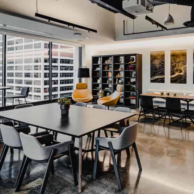 Modern meeting space with sleek furniture for collaborative workshops at Convene WorkPlace.