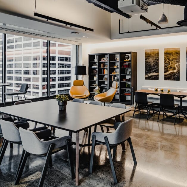 Modern meeting space with sleek furniture for collaborative workshops at Convene WorkPlace.