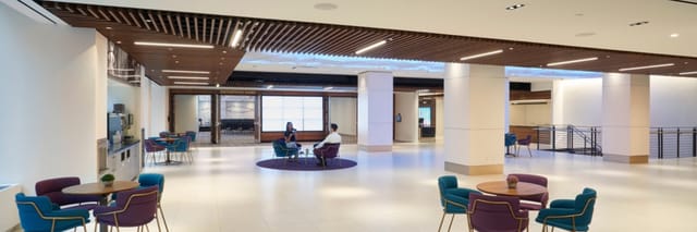 Modern event space with stylish seating, ideal for corporate and social gatherings.