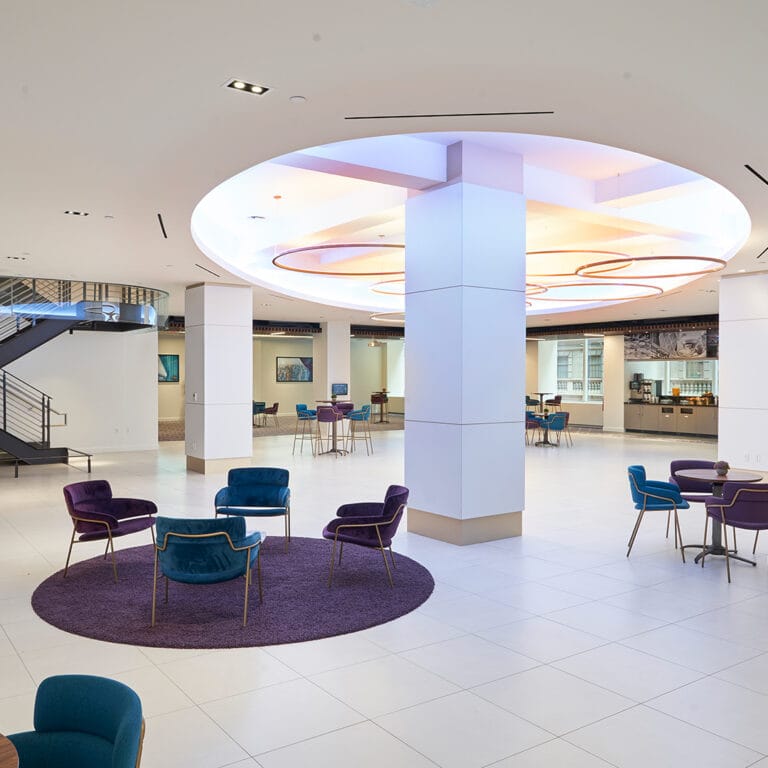 Versatile meeting space at Convene 360 Madison, featuring modern design and colorful seating.