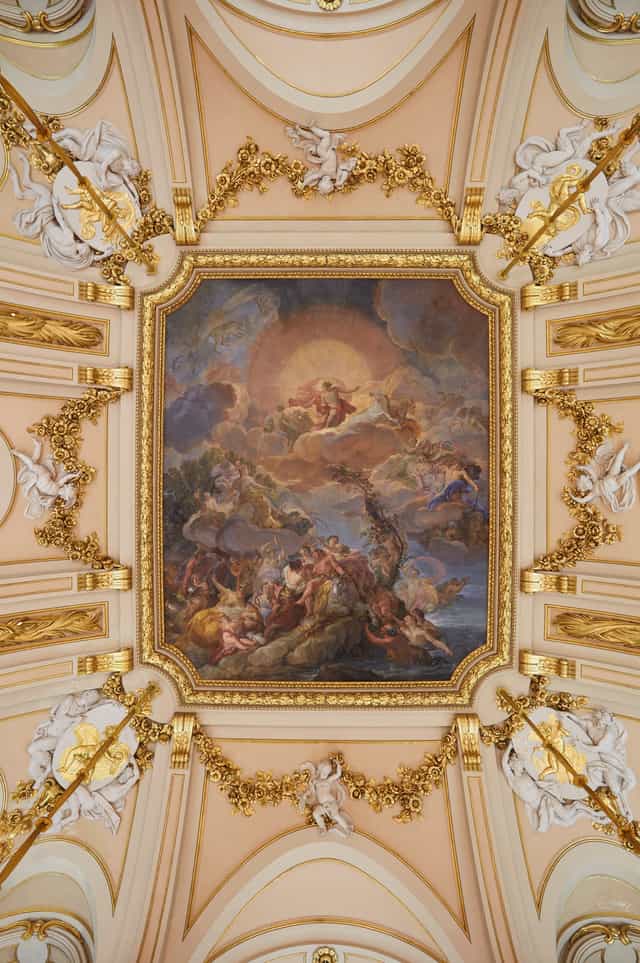 Ornate ceiling mural in Salón de Columnas, perfect for gala dinners and formal events.
