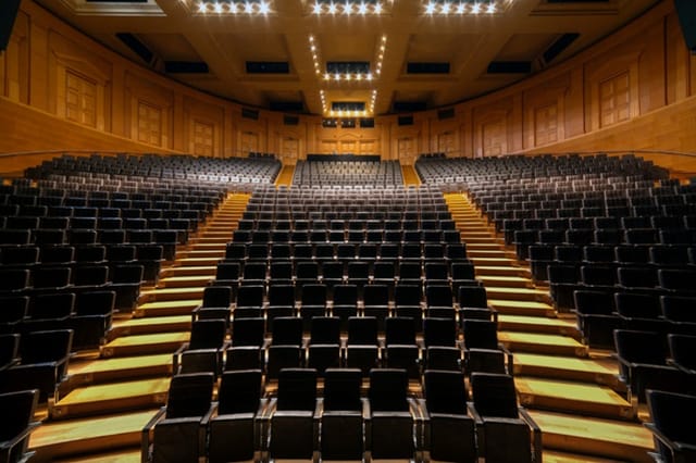 Sala Tallers auditorium at Teatre Nacional de Catalunya, ideal for conferences with tiered seating.
