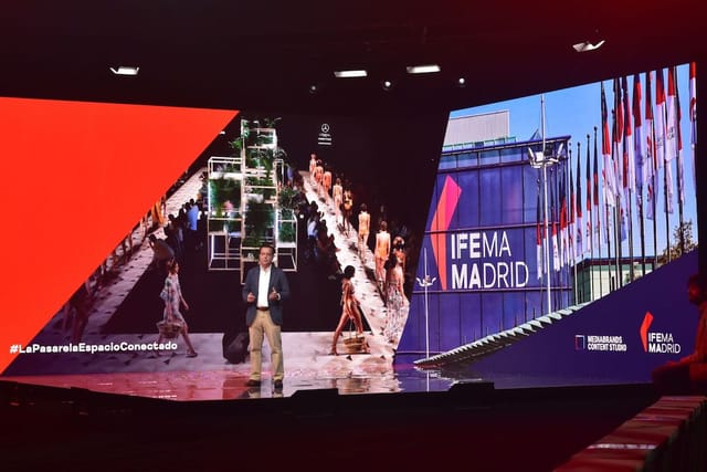 "Dynamic multi-purpose space at IFEMA Madrid with vibrant lighting for impactful events."