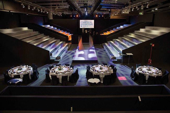 Versatile event space at IFEMA MADRID featuring tiered seating for elegant galas.