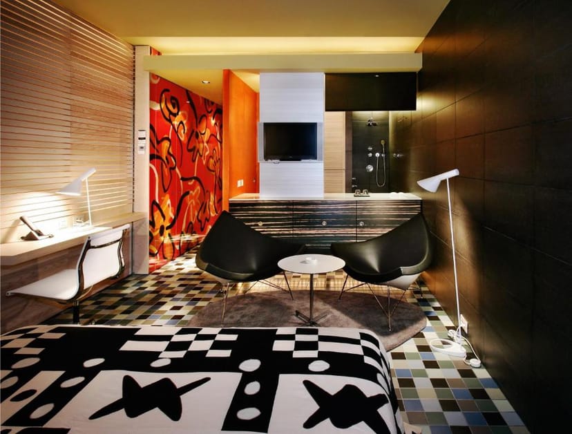 Modern hotel room at Puerta América for creative meetings and brainstorming retreats.