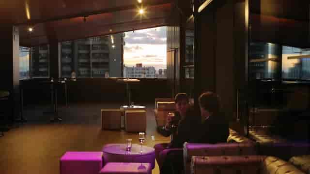 Stylish rooftop Skynight Lounge at Puerta América Hotel for networking or intimate gatherings.