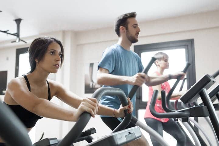 Group exercising in Hotel Gran Bilbao's fitness room for health-focused events.