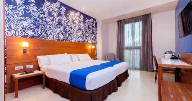 Exercise room in Hotel Gran Bilbao, featuring modern amenities for corporate events.