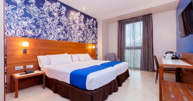 Exercise room in Hotel Gran Bilbao, featuring modern amenities for corporate events.