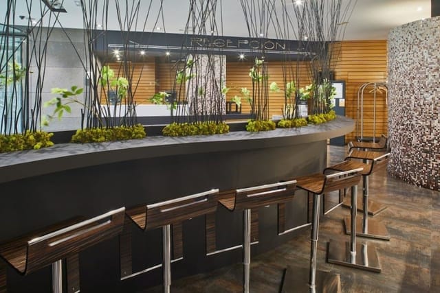 Sleek reception area at Silken Gran Teatro Burgos, perfect for events and networking.