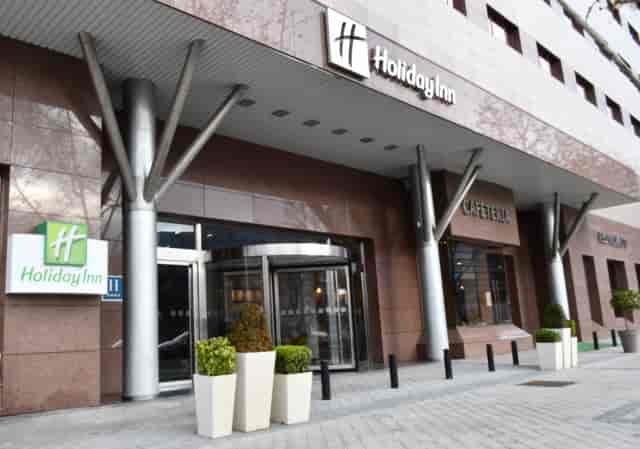 Modern Holiday Inn Madrid exterior, ideal for corporate events and meetings.