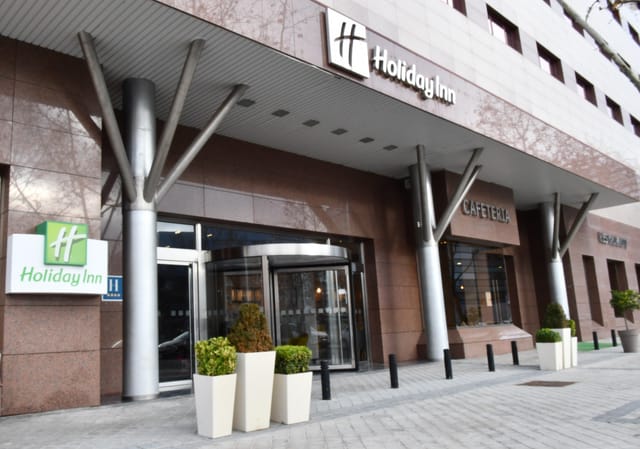 Modern Holiday Inn Madrid exterior, ideal for corporate events and meetings.