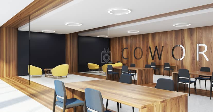 Modern meeting space in The Shed Coworking with flexible seating and bright accents.