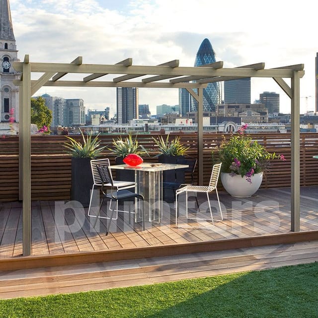 Stylish La Pérgola outdoor meeting space with modern pergola and greenery for events.