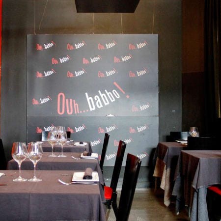 Stylish restaurant dining setup at Ouh...babbo, perfect for events and celebrations.