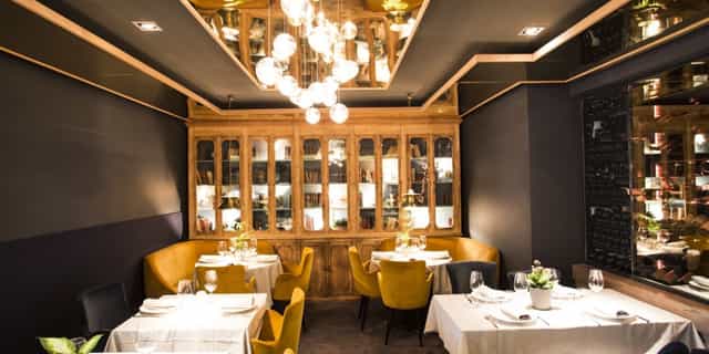 Intimate dining space at Ten Con Ten for upscale corporate meetings and private events.