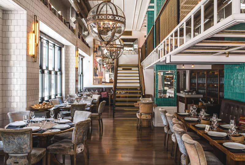Elegant Casa Mono restaurant with flexible seating for events and gatherings.