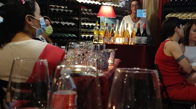 Wine tasting event at La Bodega de los Reyes with elegant table and cozy ambiance.