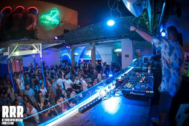 DJ performing at La Terrrazza Disco club during vibrant nightlife event.