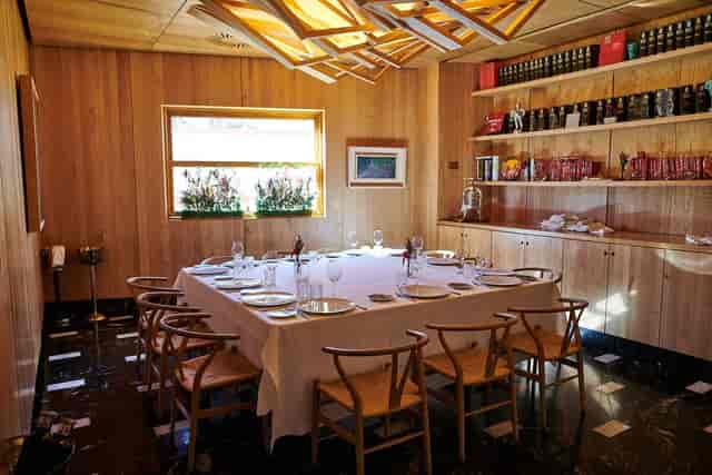 Intimate dining setting at A'Barra for exclusive corporate events and private dinners.