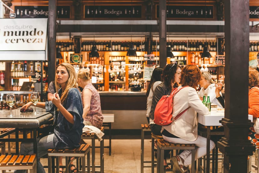 Dining area in Mercado de San Miguel, ideal for networking events and casual gatherings.