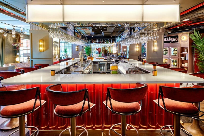 Stylish bar setup at Radisson RED Madrid for cocktail receptions and networking events.