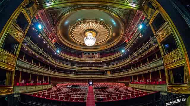 Elegant Teatro de la Zarzuela theater with ornate ceiling, ideal for grand performances.