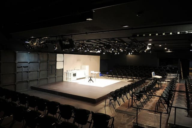 Teatro Fernán Gómez auditorium with staged area, ideal for performances and workshops.