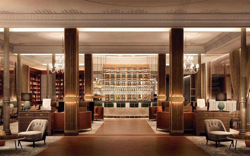 Elegant hotel lobby with sophisticated bar, ideal for networking events at Gran Hotel Inglés.