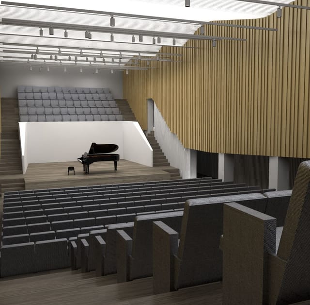 Modern auditorium with tiered seating, perfect for concerts and corporate events.
