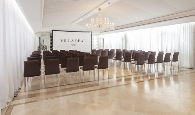 Neptune Meetings Room at Hotel Villa Real, modern space for corporate events and presentations.