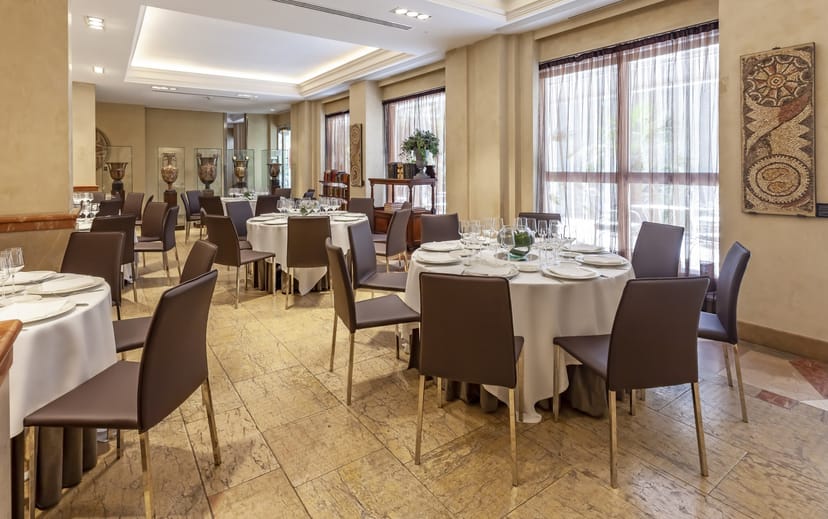 Neptune Meetings Room at Hotel Villa Real, elegant event space for dinners and networking.