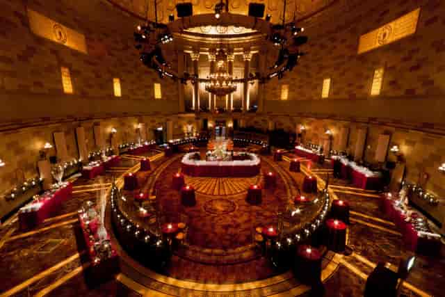 Gotham Hall event space with elegant tables, perfect for upscale galas or corporate functions.