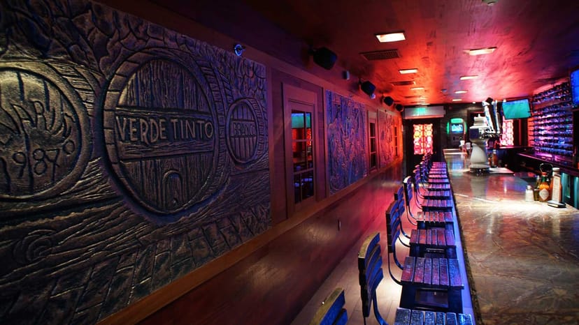 Stylish bar area at Adega Grill, perfect for social and corporate gatherings.