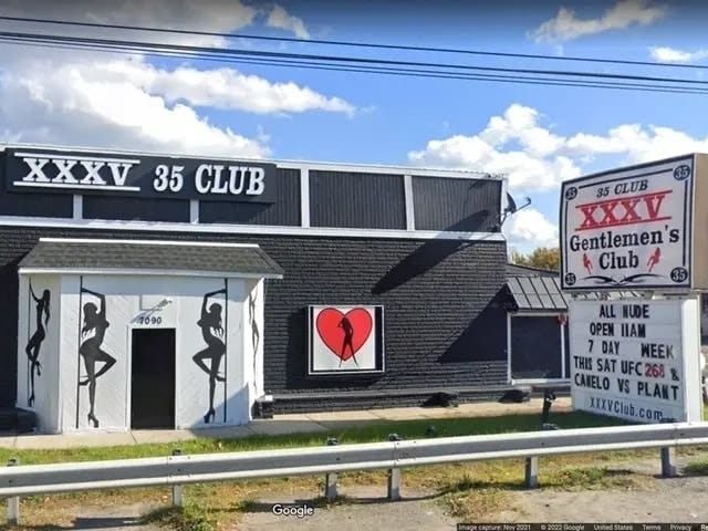 Main Stage at XXXV Gentlemen's Club, vibrant venue for unique corporate events.
