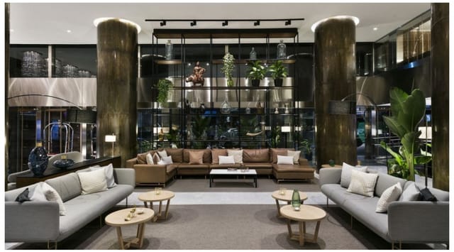 Modern lobby at Meliá Madrid Princesa, perfect for events and networking.