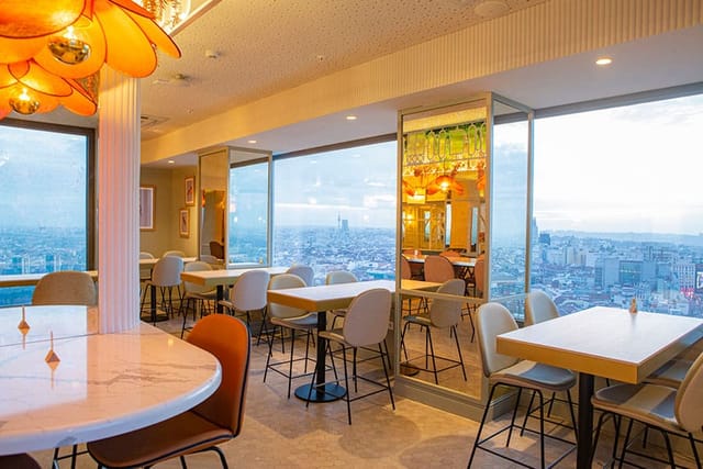 Modern event space with panoramic views in Hotel Riu Plaza España for upscale gatherings.