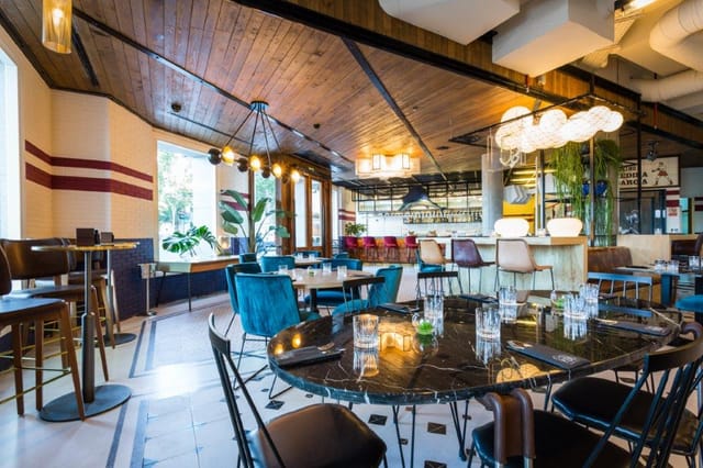 Modern event space at Only YOU Hotel Atocha with elegant seating and natural light.