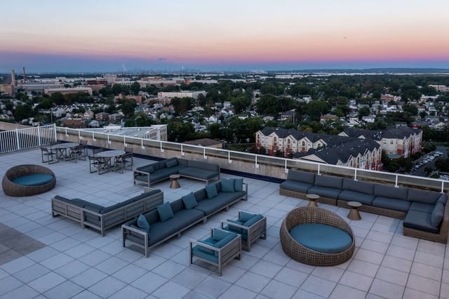 Industrial-chic rooftop bar at Watt Hotel Rahway, perfect for cocktail receptions and events.