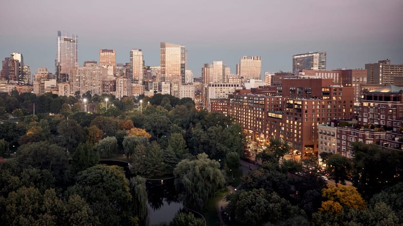 Winthrop Room at Four Seasons Boston with urban skyline, ideal for networking events.