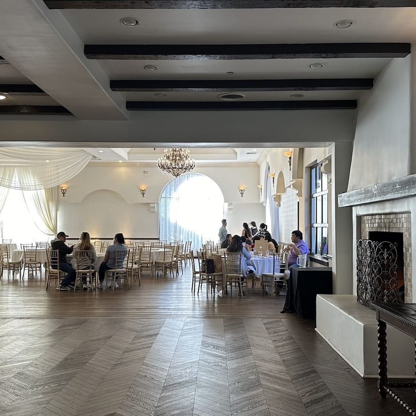 Elegant Luxe Loft Venue for formal dinners and receptions with chandeliers and soft lighting.