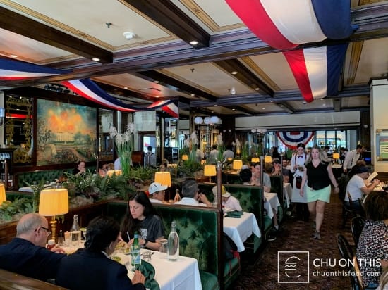 Bar at Old Ebbitt Grill with plush seating, ideal for gatherings and dining events.