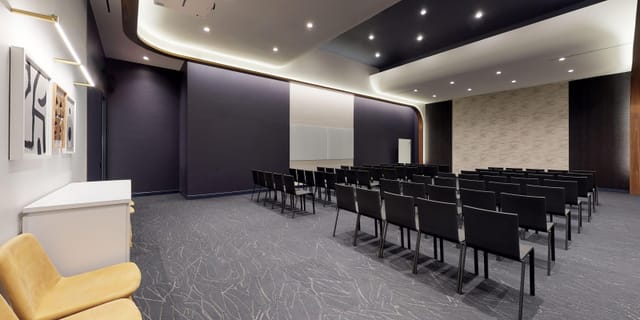 Modern meeting room with flexible seating for engagement and productivity events.