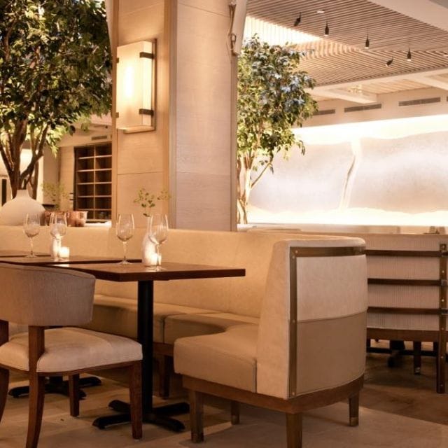 Sophisticated bar at Avra Madison, ideal for intimate dinners and networking events.