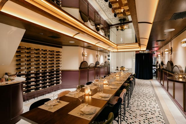 Elegant mezzanine dining space at L'Artusi, perfect for exclusive events and gatherings.