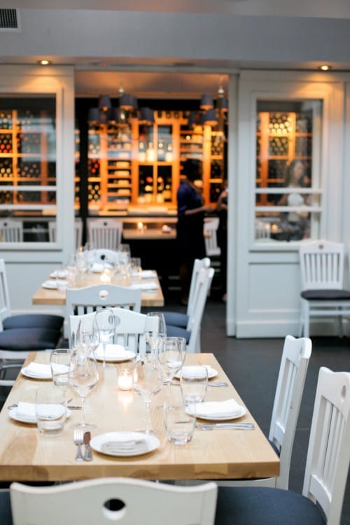 Elegant dining area at L'Artusi's mezzanine, ideal for gatherings and corporate events.