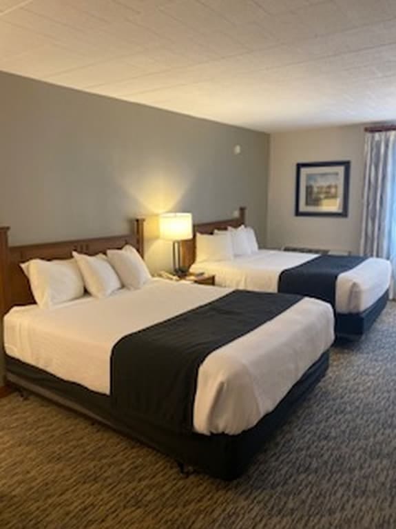 Lodge at Wisp hotel room with plush beds, perfect for business events and meetings.