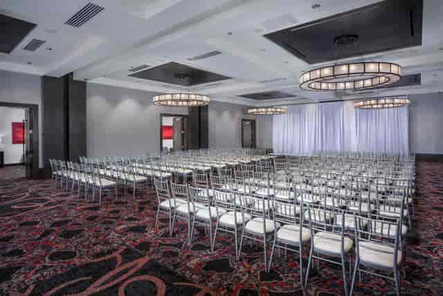 Diamond Back Boardroom with silver chiavari chairs, ideal for conferences and presentations.