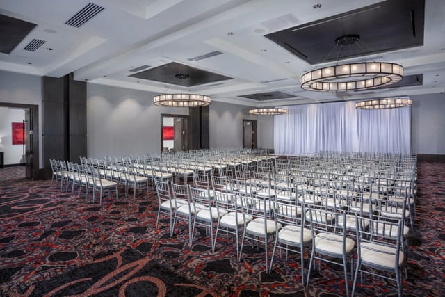 Diamond Back Boardroom with silver chiavari chairs, ideal for conferences and presentations.