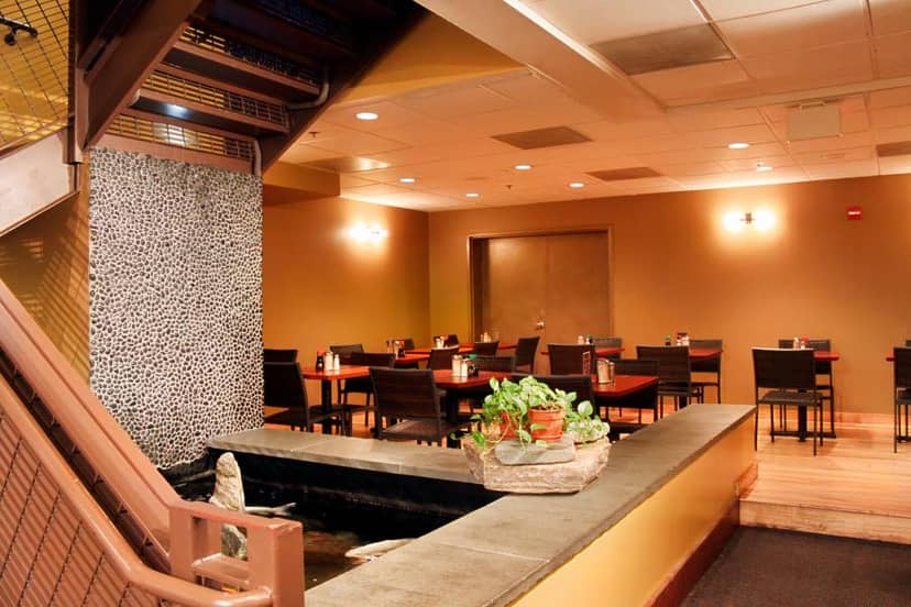 John Carroll Room at 1789 Restaurant, serene venue with water feature for events.